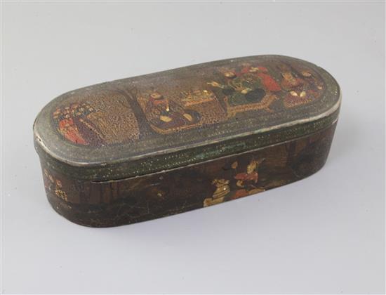 A 19th century Persian Qajar lacquered and gilt scribes casket (Qalamdan), height 3.25in. width 11in